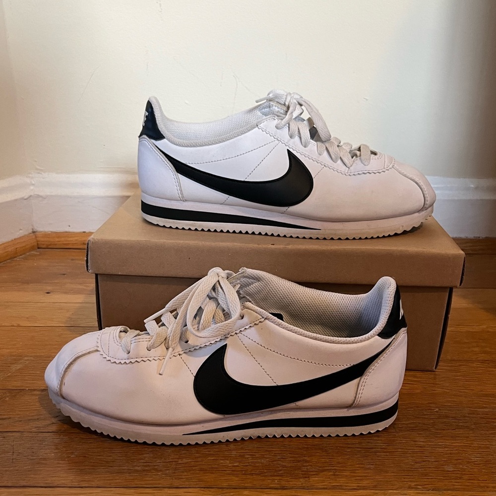Women’s Nike Cortez - size 9. White with black detail. Lightly worn.